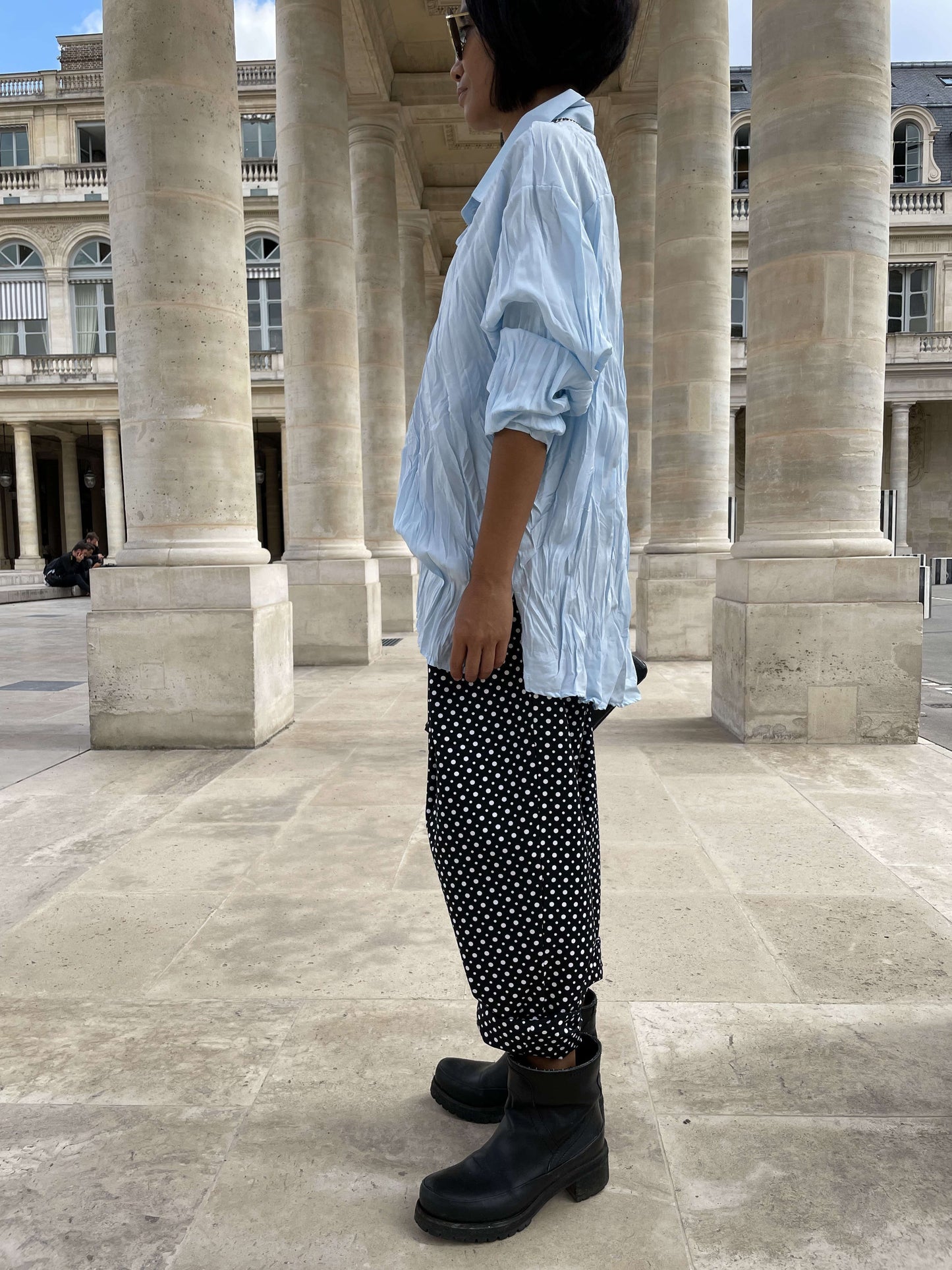 Pantalon noir à pois blancs